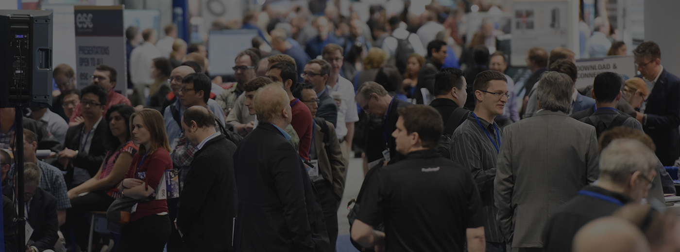 Attendees walking on the show floor