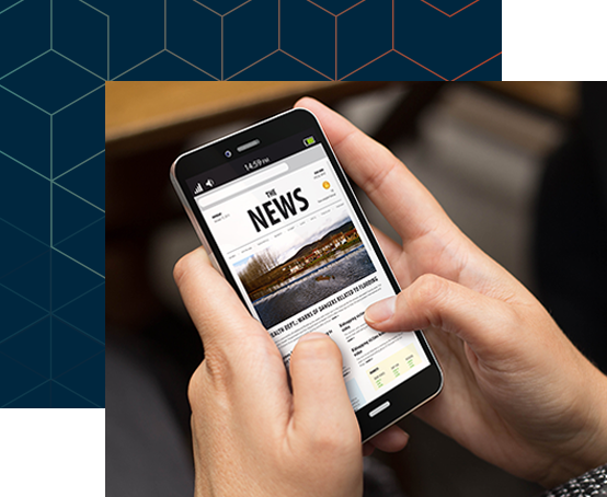 a mobile phone showing news